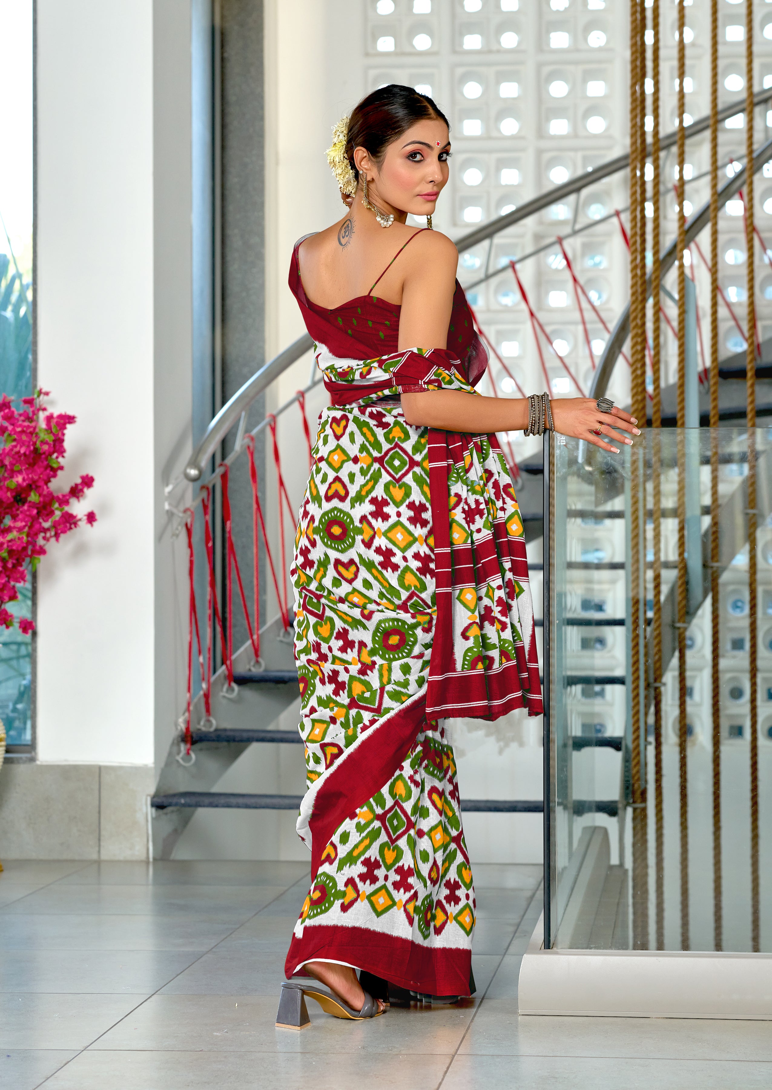 NAYANTHARA PURE MULMUL COTTON IKKAT PRINTD MARRON AND GREEN SAREE