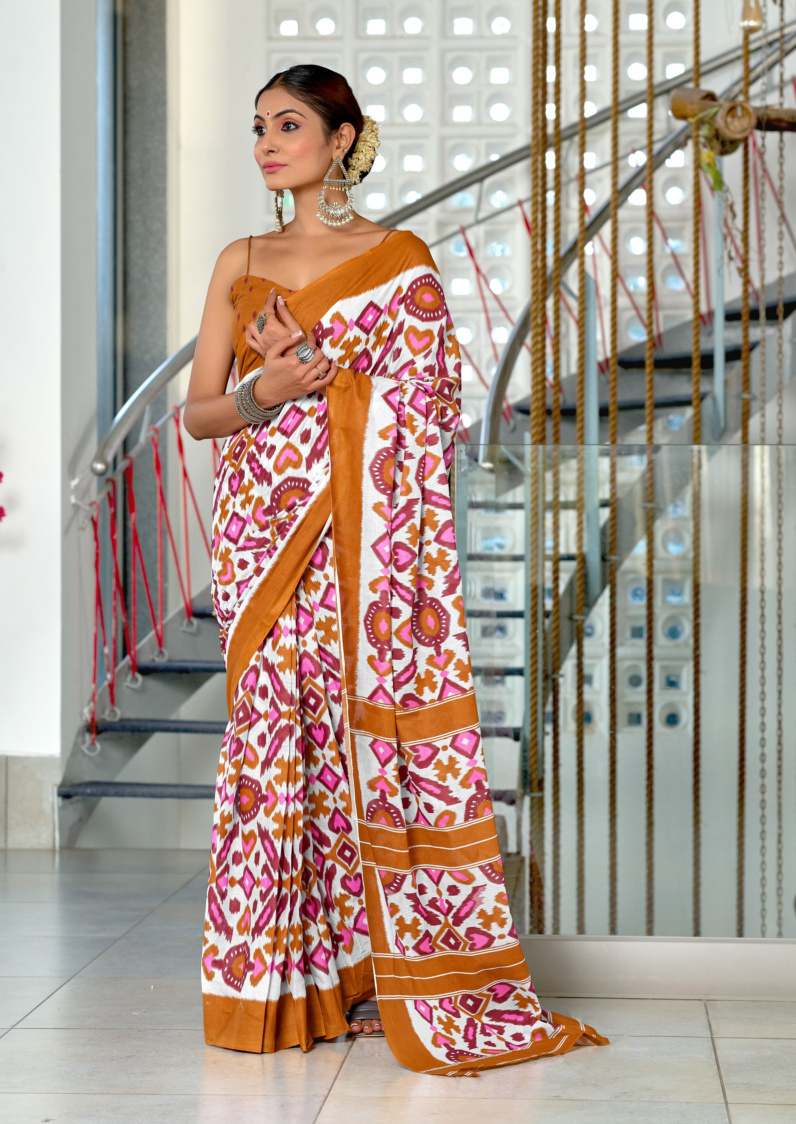 NAYANTHARA PURE MULMUL COTTON IKKAT PRINTD MUSTARD AND PINK SAREE