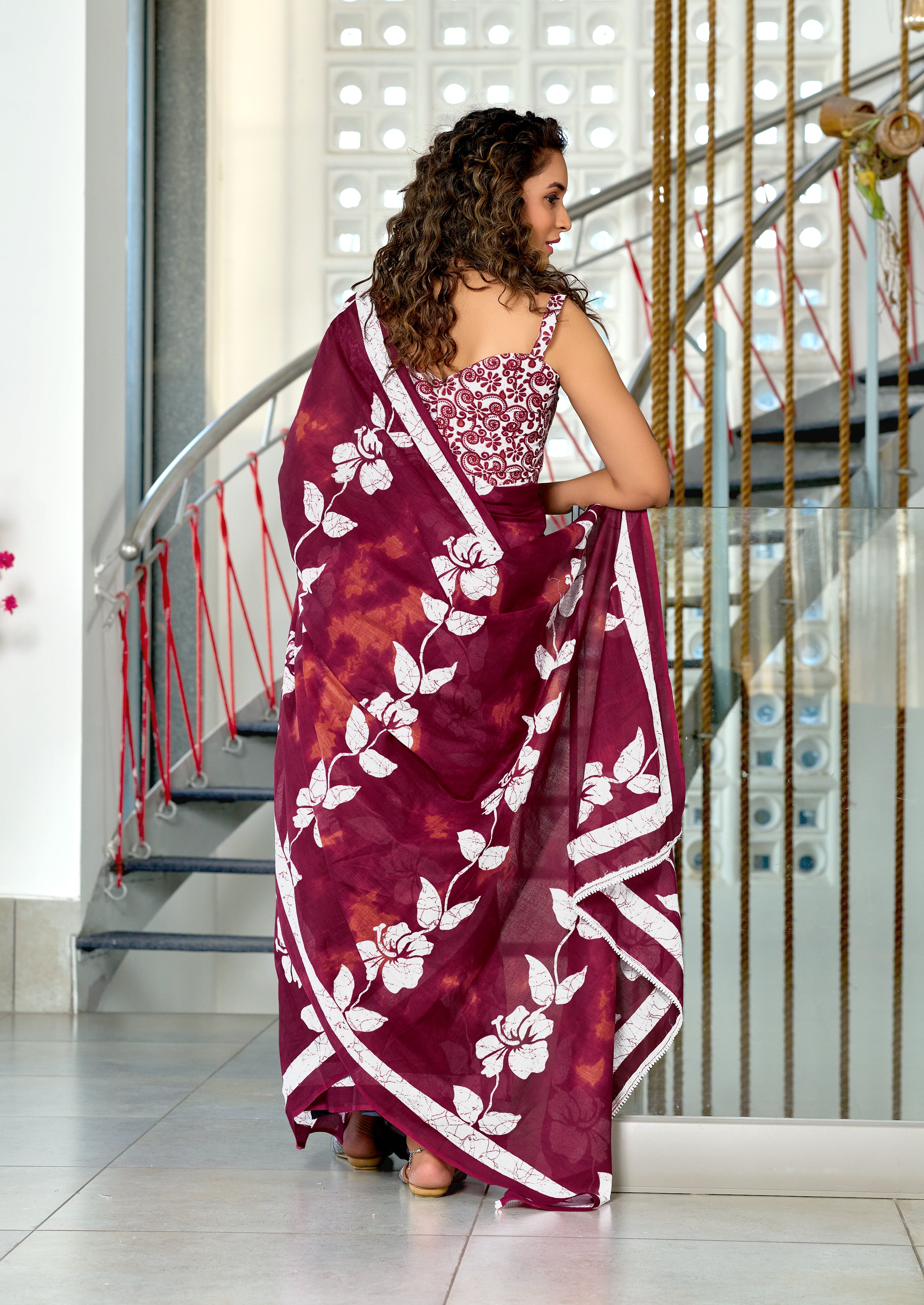 PETAL PARADISE FLORAL HAND PRINT MULMUL COTTON MAROON SAREE
