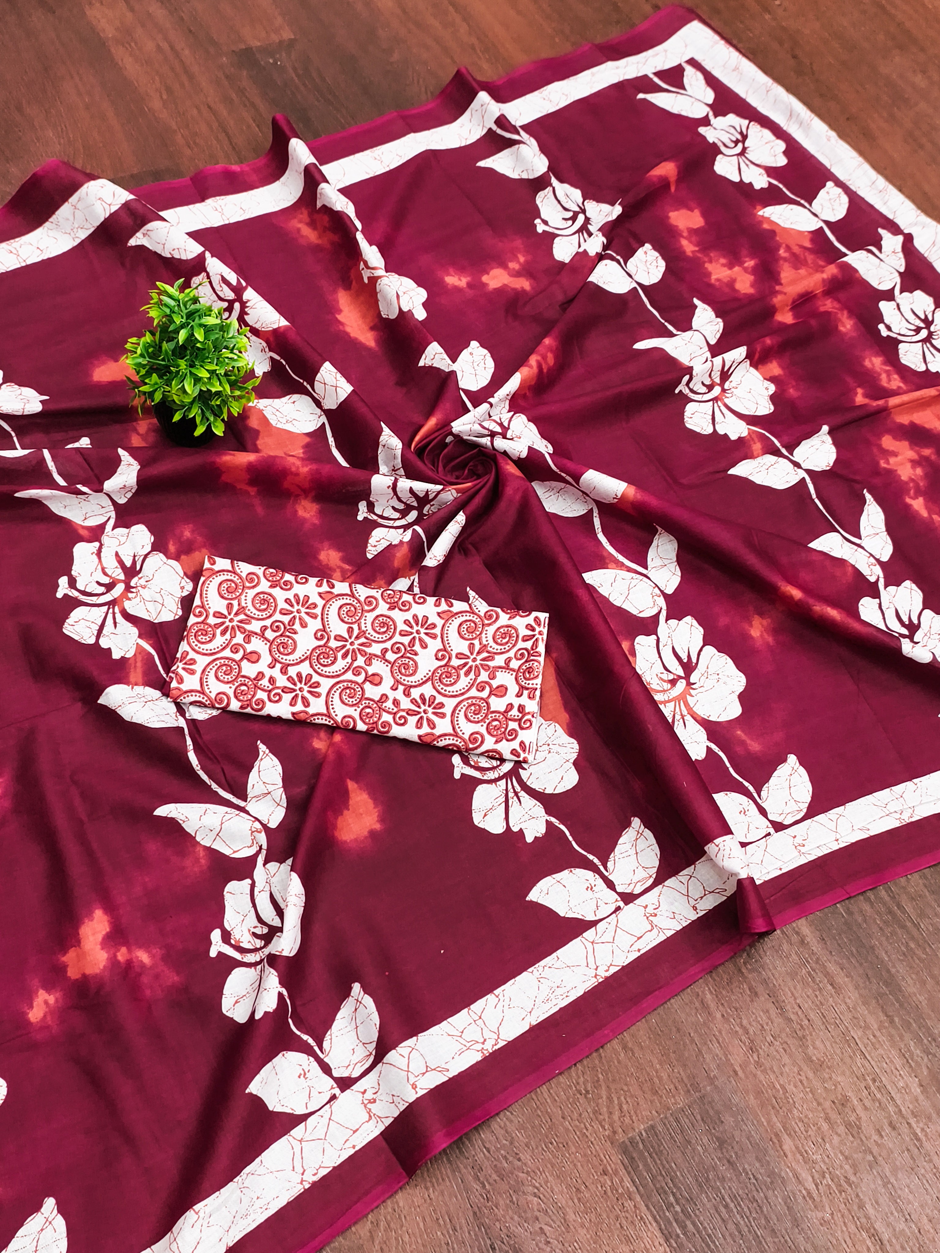 PETAL PARADISE FLORAL HAND PRINT MULMUL COTTON MAROON SAREE