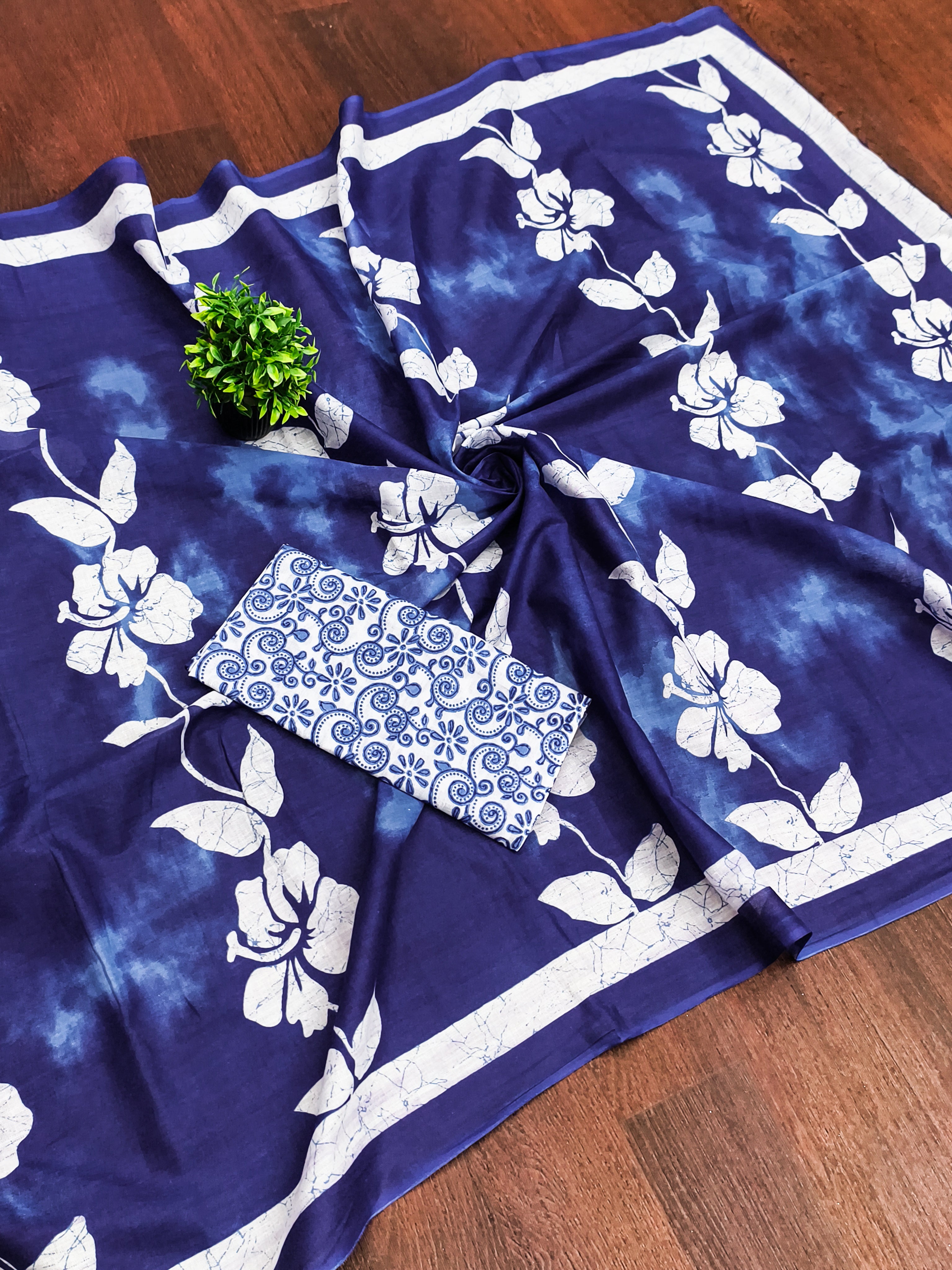 PETAL PARADISE FLORAL HAND PRINT MULMUL COTTON NEVY BLUE SAREE