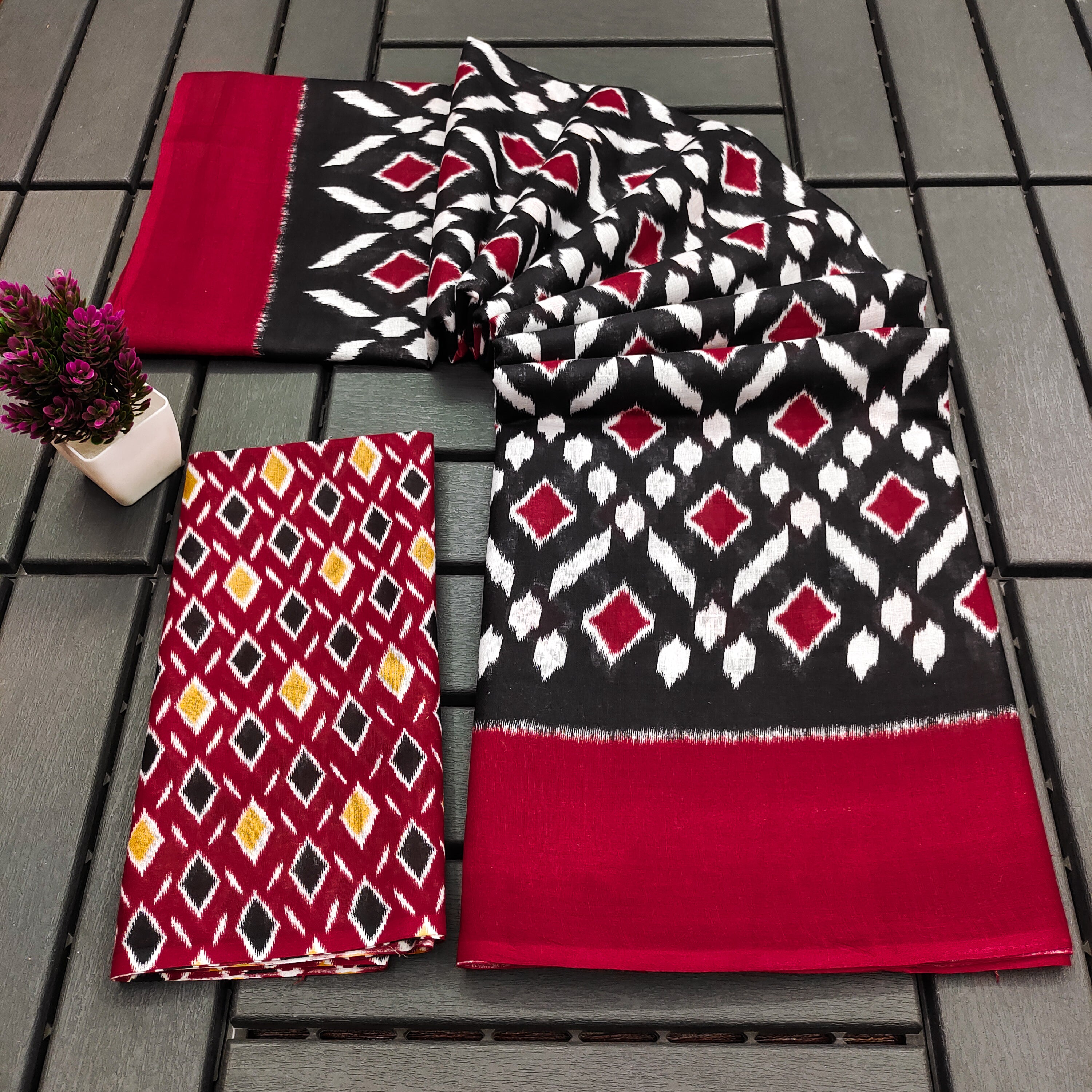 SIMRAN PURE MULMUL COTTON IKKAT  PRINTED BLACK SAREE