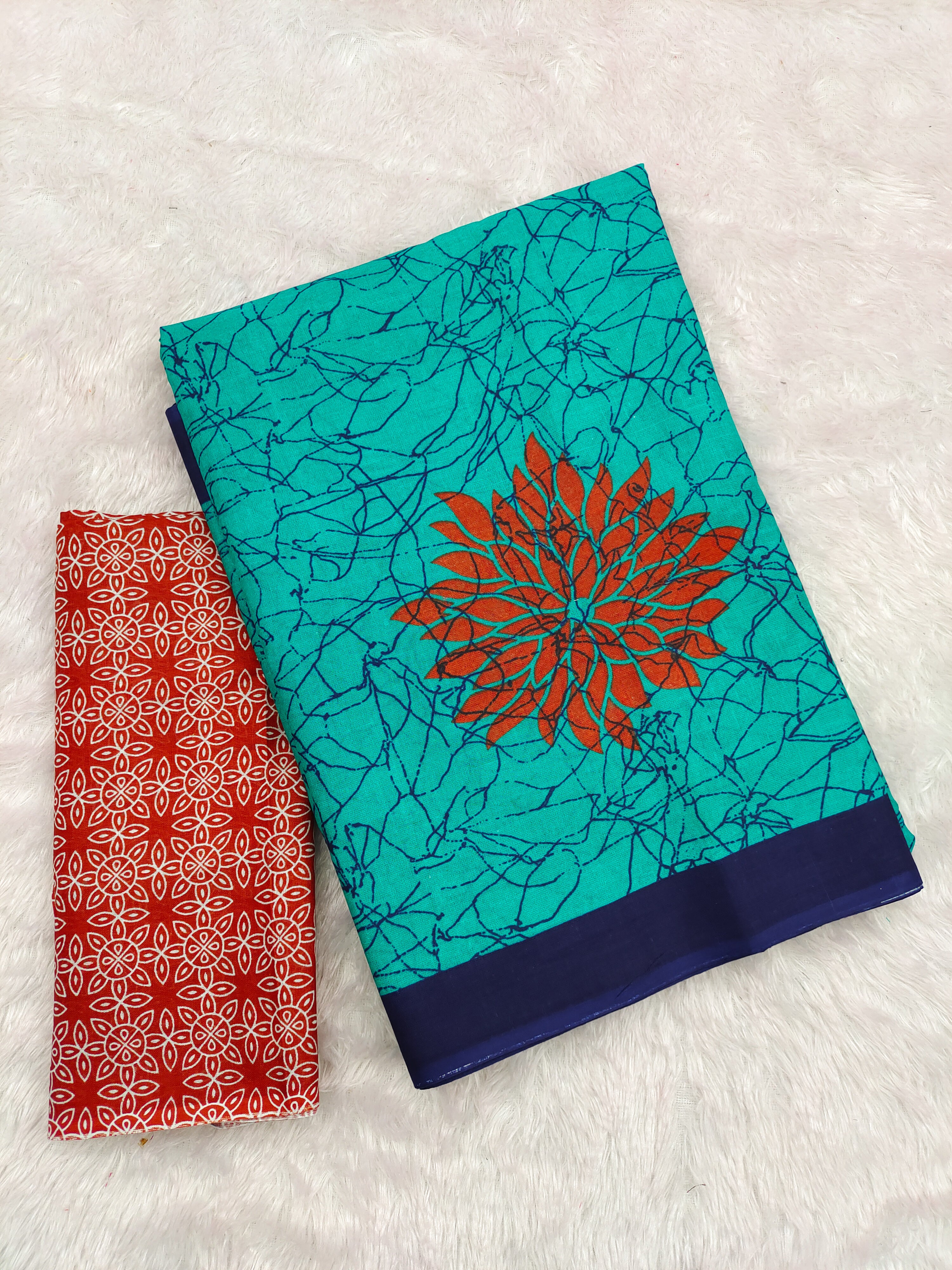 SRIVIDYA PURE MULMUL FLORAL BLOCK PRINTD AQUA SAREE