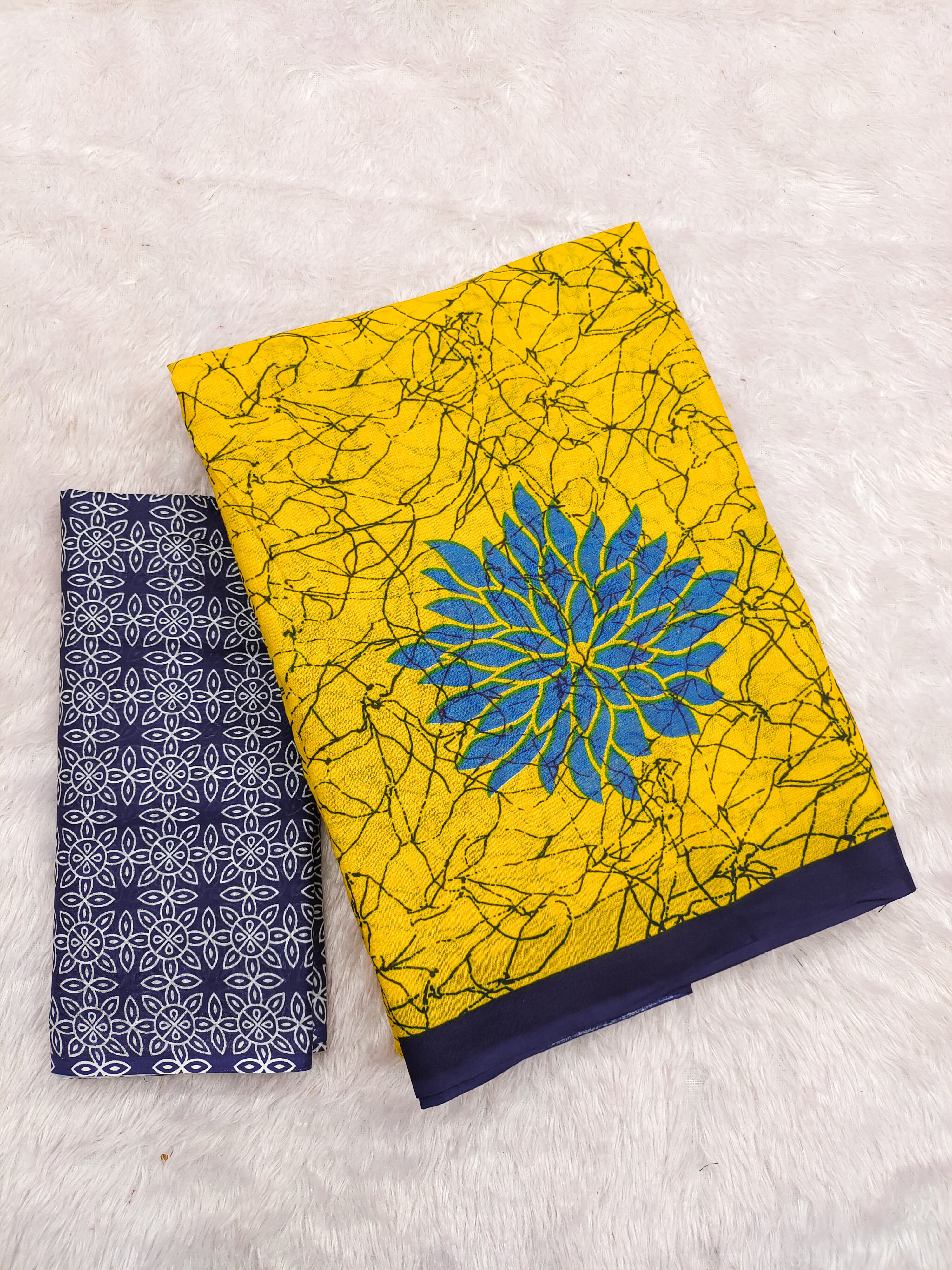 SRIVIDYA PURE MULMUL FLORAL BLOCK PRINTD YELLOW SAREE