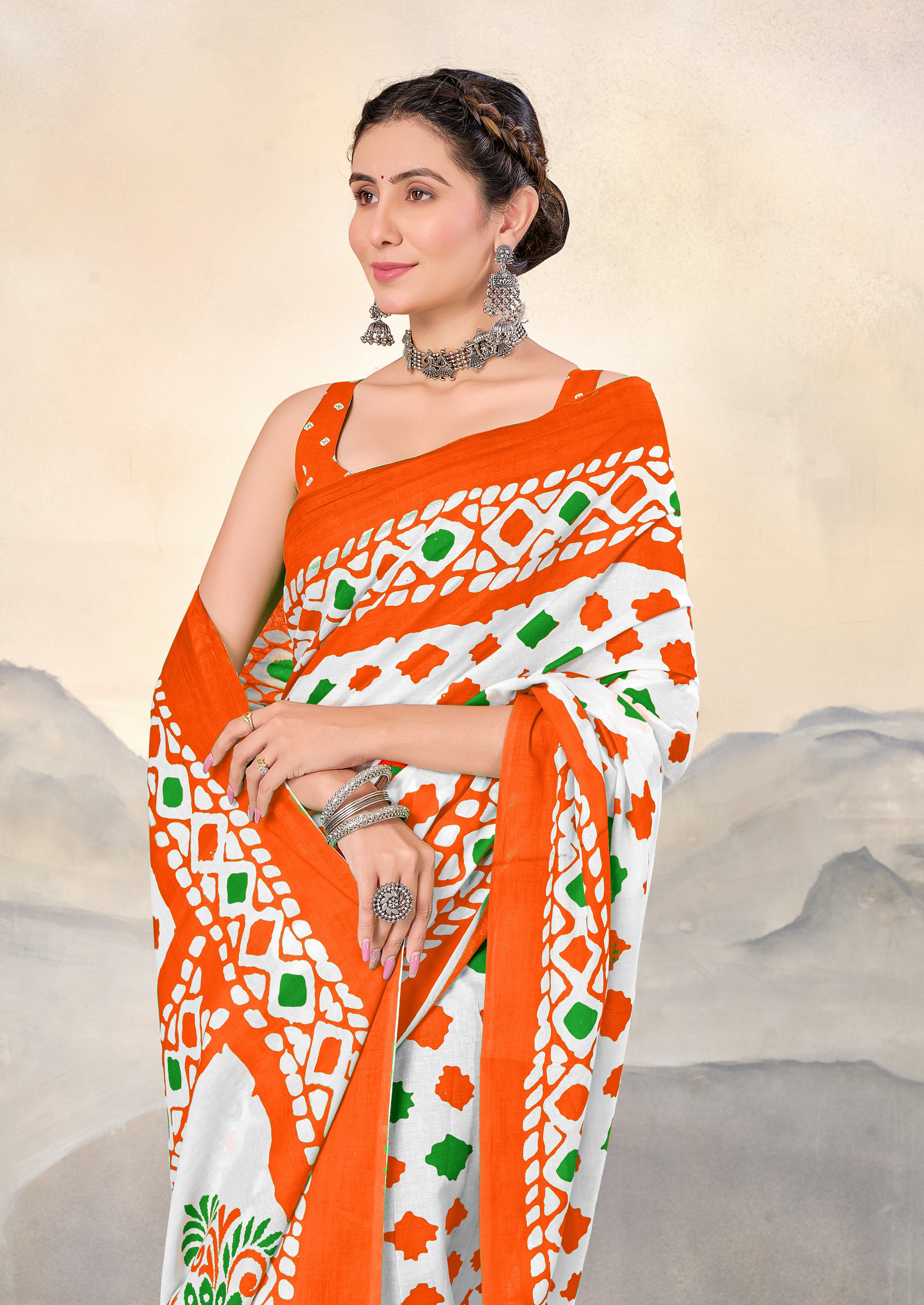 TIRNGA SOFT PURE COTTON BLOCK PRINTED ORANGE SAREE
