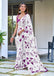 AKRUTI PURE MULMUL COTTON FLORAL STYLE HAND BLOCK PRINTD WHITE AND PURPLE SAREE