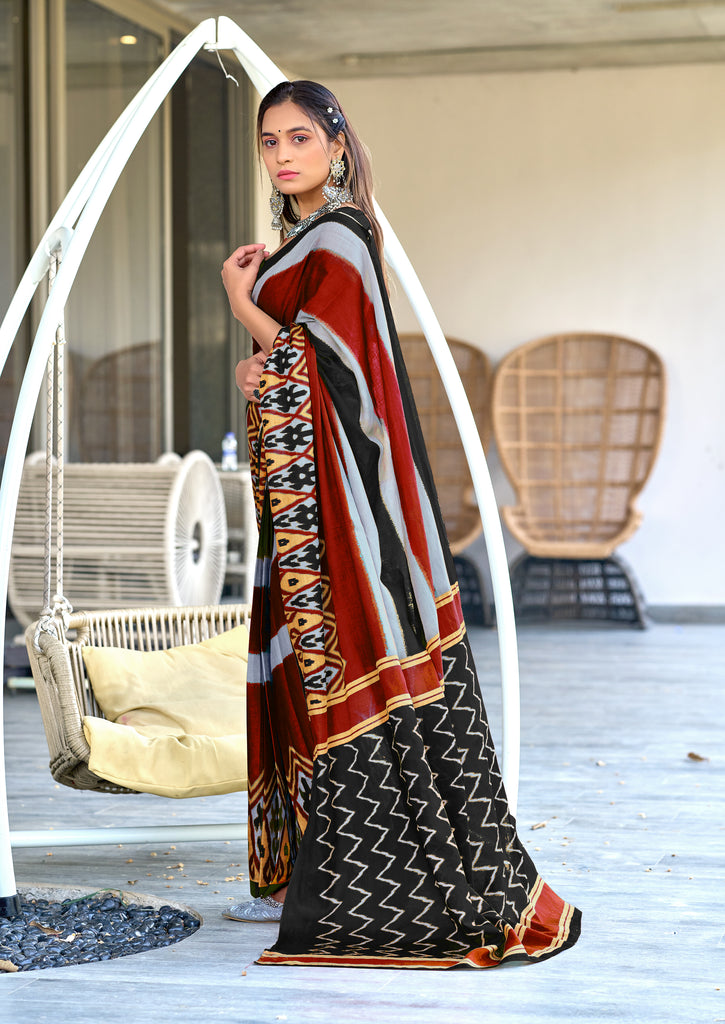 BLOOMING IKKAT HAND PRINT MULMUL COTTON BLACK SAREE