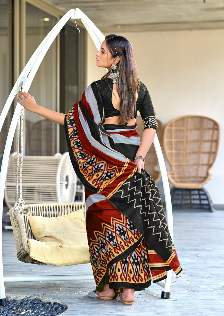 BLOOMING IKKAT HAND PRINT MULMUL COTTON BLACK SAREE