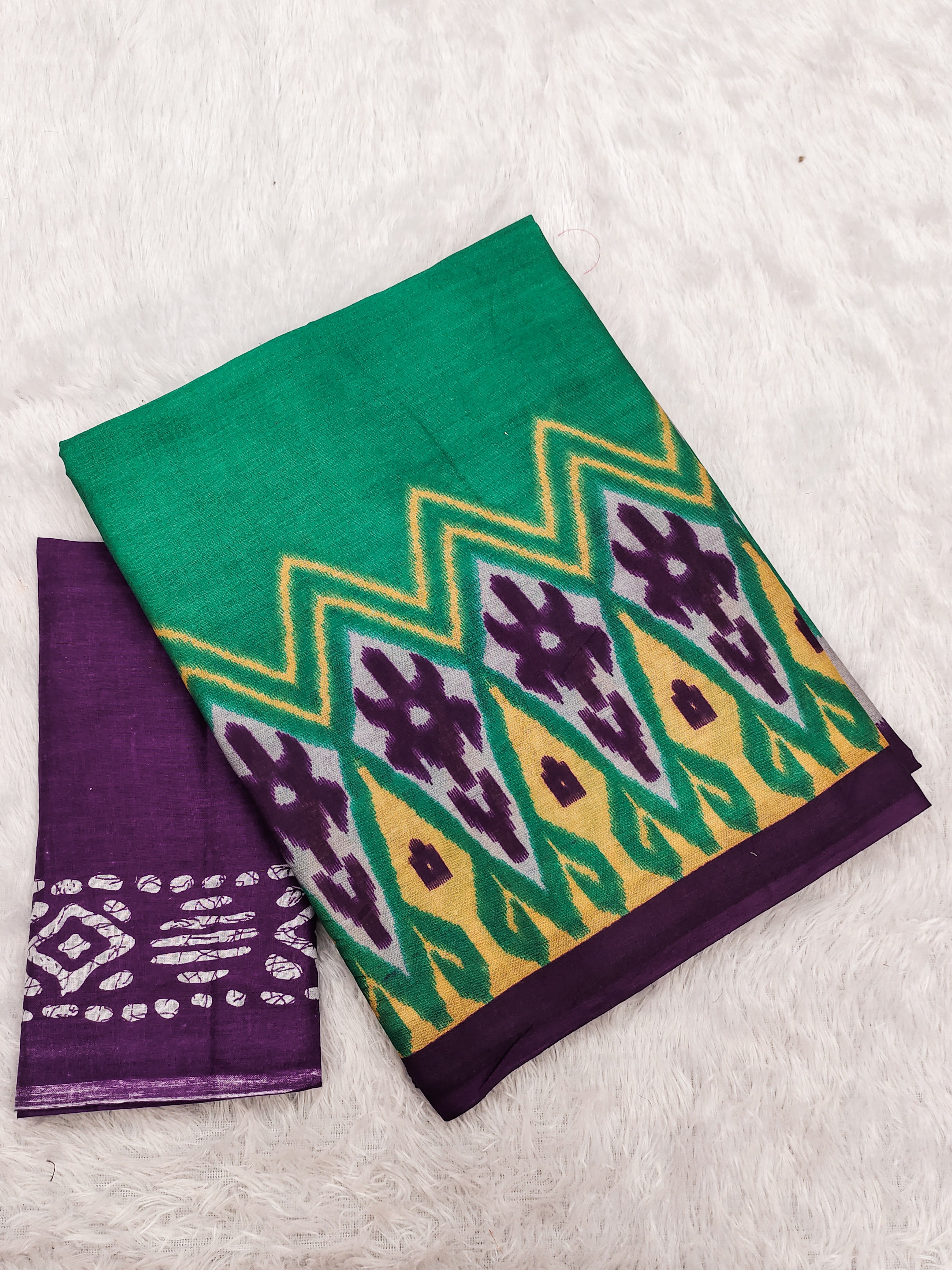 BLOOMING IKKAT HAND PRINT MULMUL COTTON GREEN SAREE