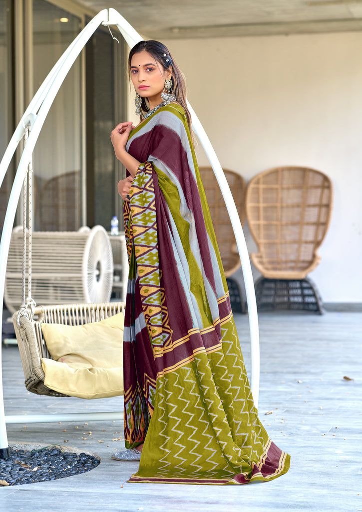 BLOOMING IKKAT HAND PRINT MULMUL COTTON MEHNDI GREEN SAREE