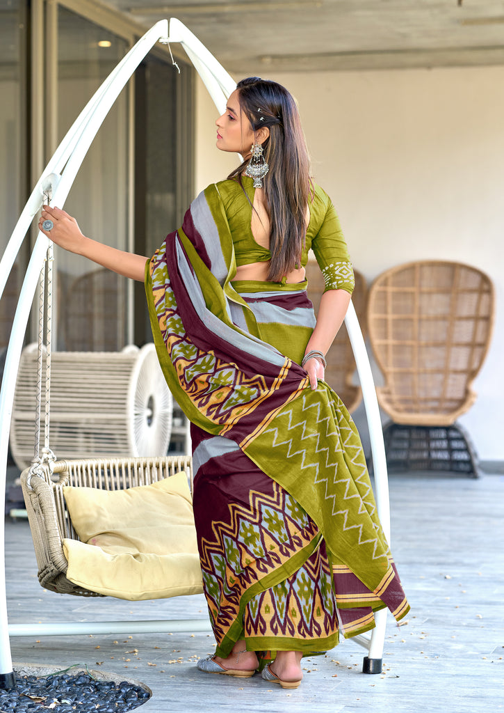 BLOOMING IKKAT HAND PRINT MULMUL COTTON MEHNDI GREEN SAREE