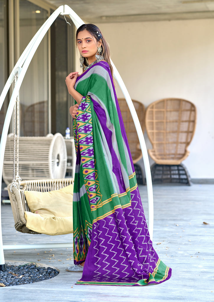 BLOOMING IKKAT HAND PRINT MULMUL COTTON PURPLE SAREE