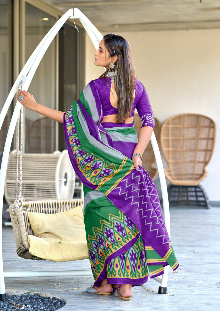BLOOMING IKKAT HAND PRINT MULMUL COTTON PURPLE SAREE