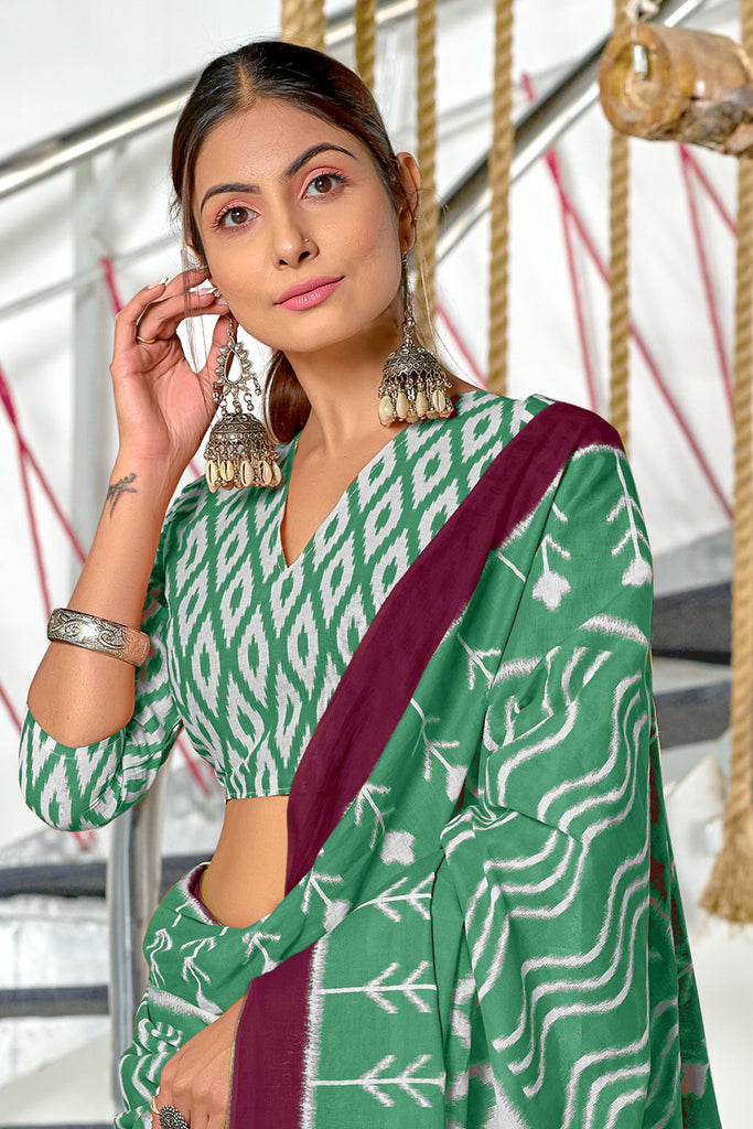 KALINI PURE MULMUL COTTON IKKAT  PRINTD BOTTLE GREEN SAREE