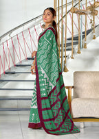 KALINI PURE MULMUL COTTON IKKAT  PRINTD BOTTLE GREEN SAREE