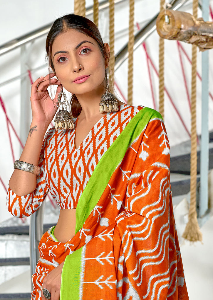 KALINI PURE MULMUL COTTON IKKAT  PRINTD ORANGE SAREE