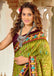 MALAVIKA PURE MULMUL COTTON IKKAT PRINTD GREEN SAREE