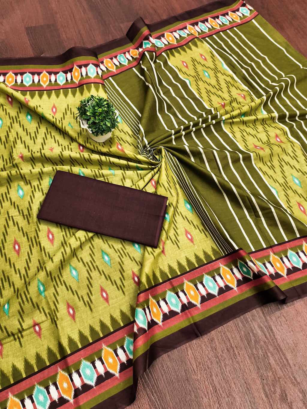 MALAVIKA PURE MULMUL COTTON IKKAT PRINTD GREEN SAREE