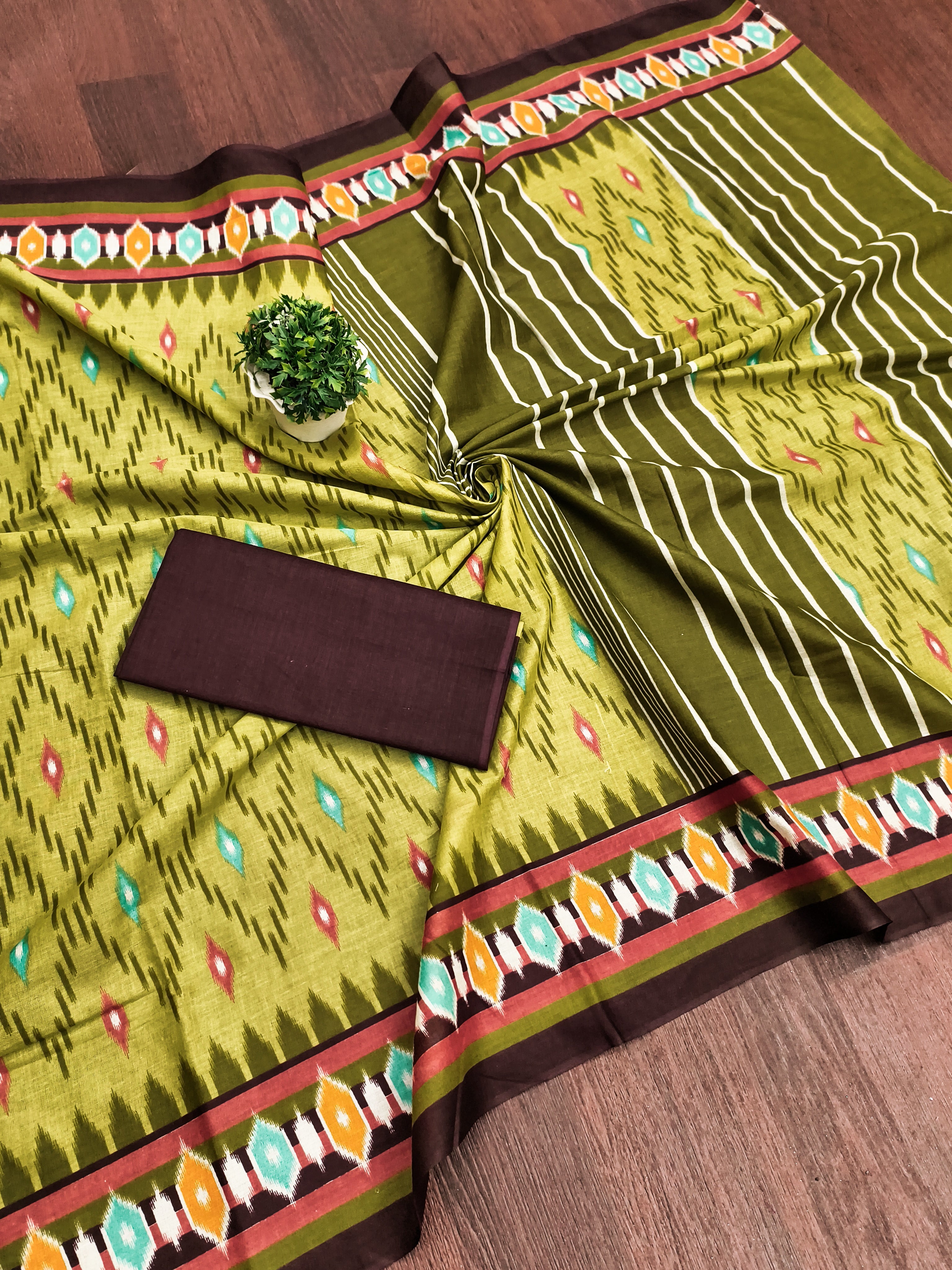 MALAVIKA PURE MULMUL COTTON IKKAT PRINTD GREEN SAREE