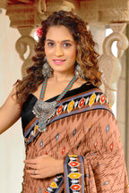 MALAVIKA PURE MULMUL COTTON IKKAT PRINTD LIGHT BROWN SAREE