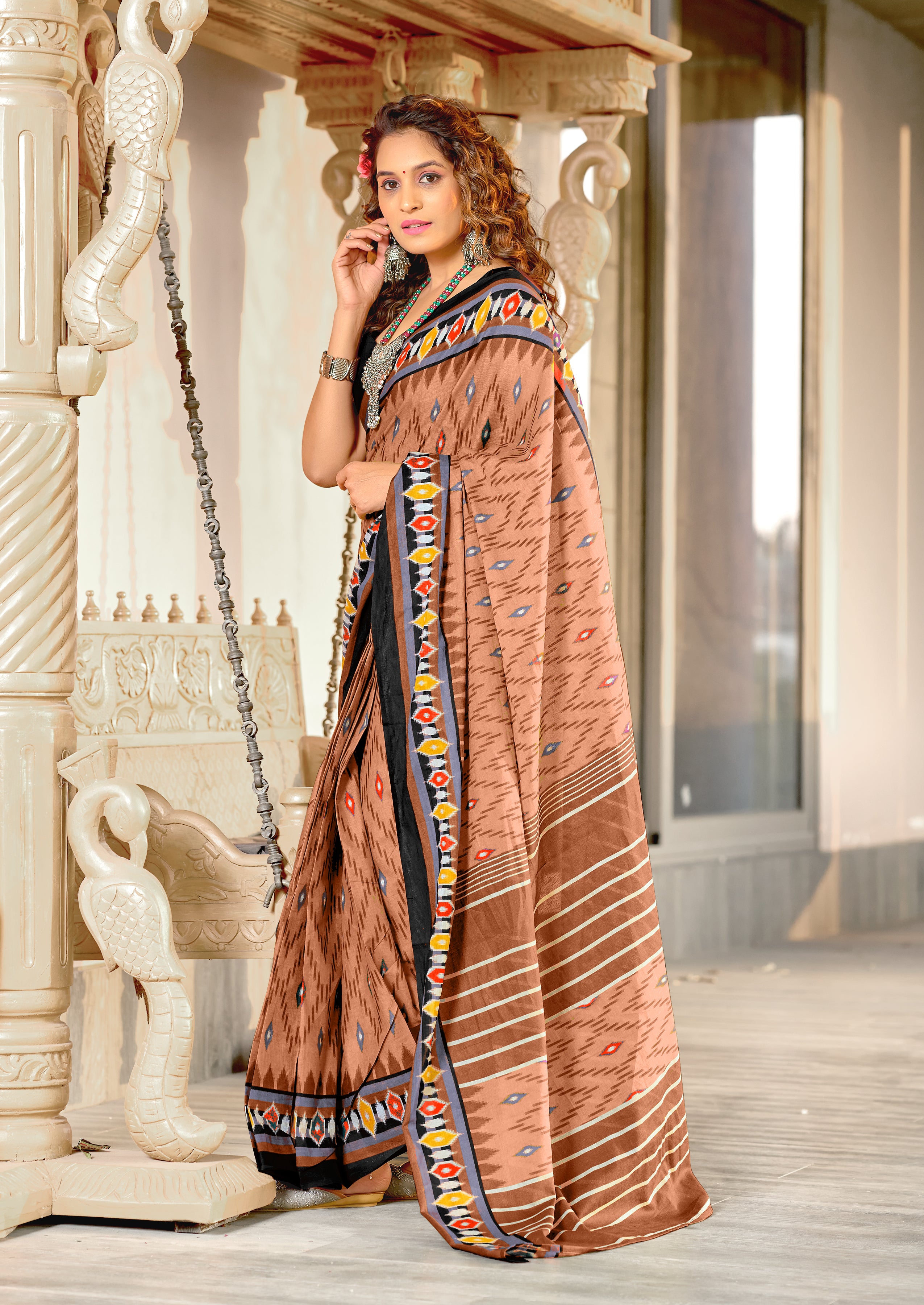 MALAVIKA PURE MULMUL COTTON IKKAT PRINTD LIGHT BROWN SAREE