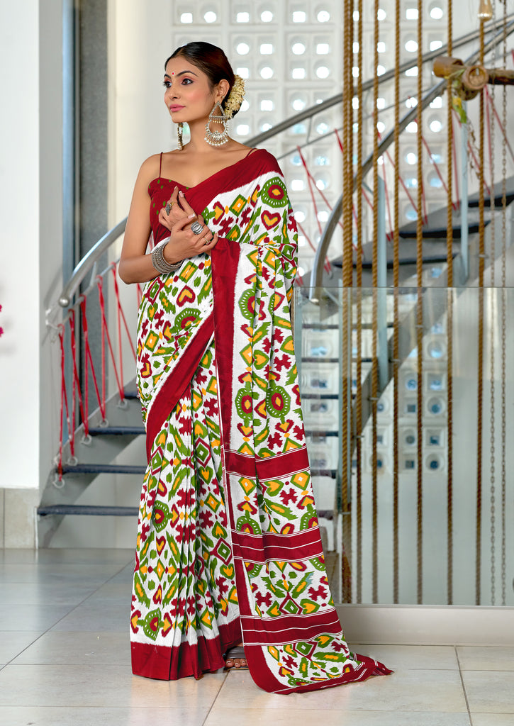 NAYANTHARA PURE MULMUL COTTON IKKAT PRINTD MARRON AND GREEN SAREE