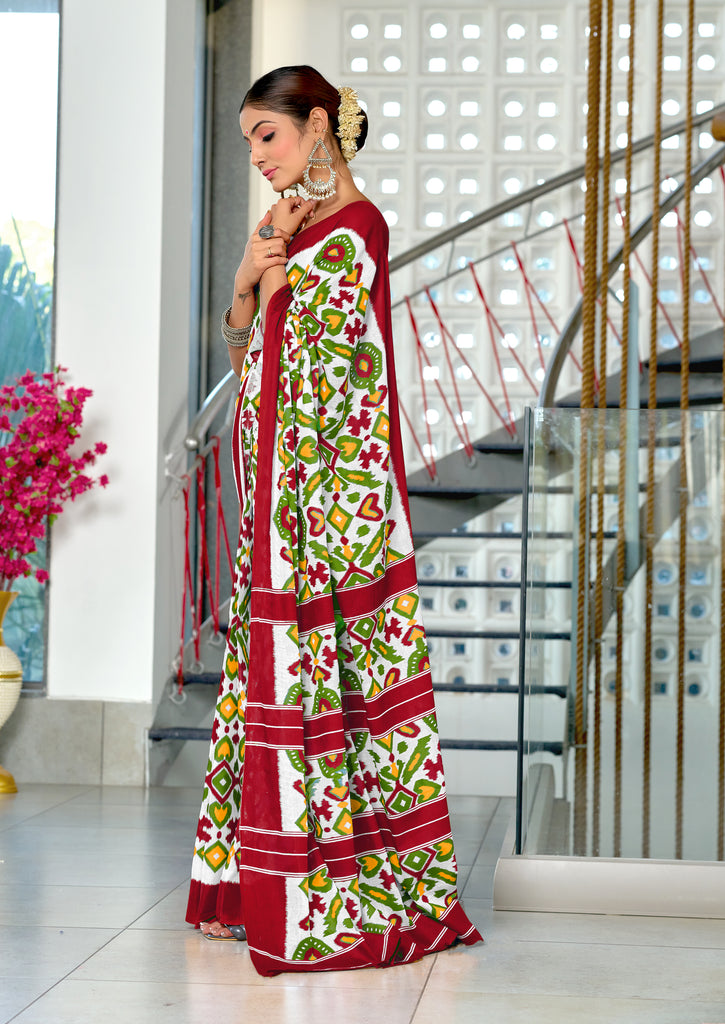 NAYANTHARA PURE MULMUL COTTON IKKAT PRINTD MARRON AND GREEN SAREE