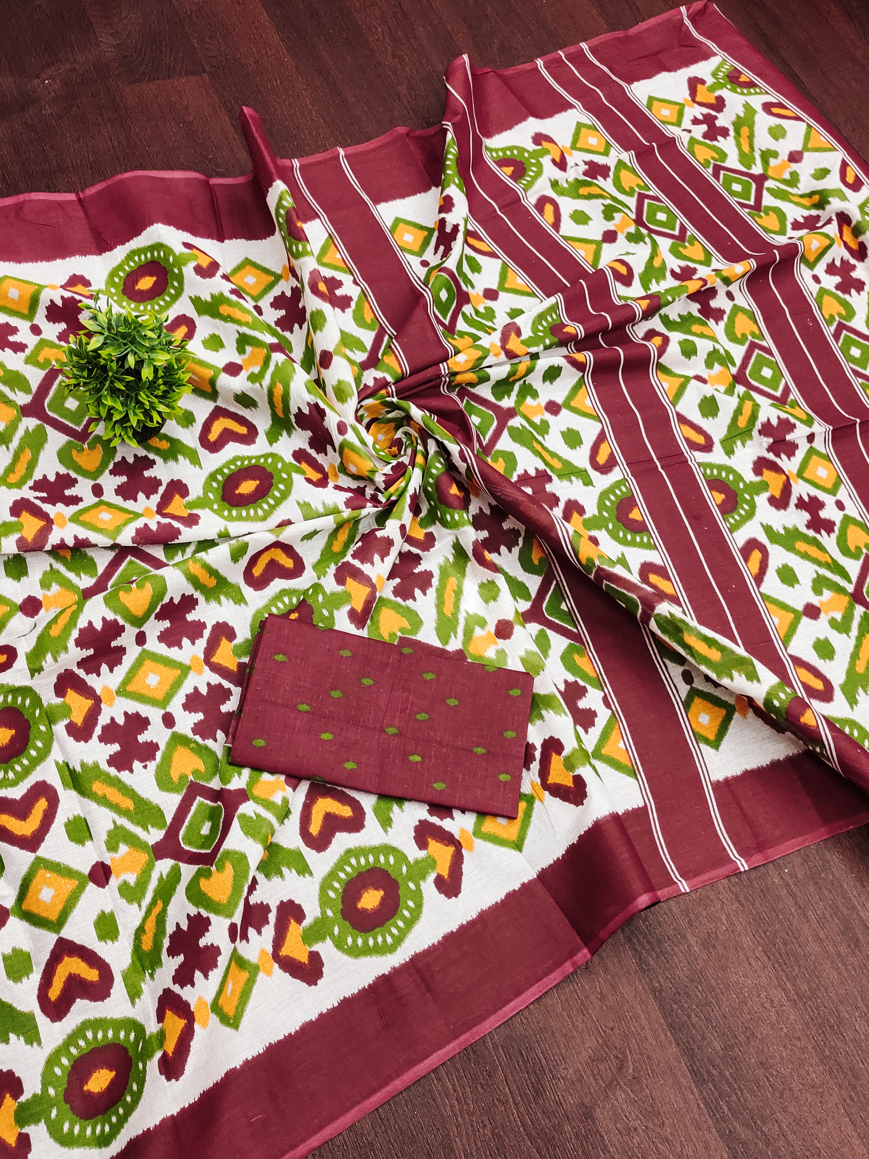 NAYANTHARA PURE MULMUL COTTON IKKAT PRINTD MARRON AND GREEN SAREE