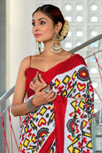 NAYANTHARA PURE MULMUL COTTON IKKAT PRINTD RED AND YELLOW SAREE