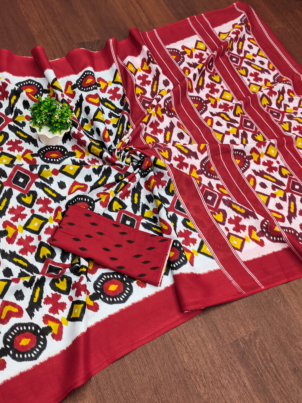 NAYANTHARA PURE MULMUL COTTON IKKAT PRINTD RED AND YELLOW SAREE