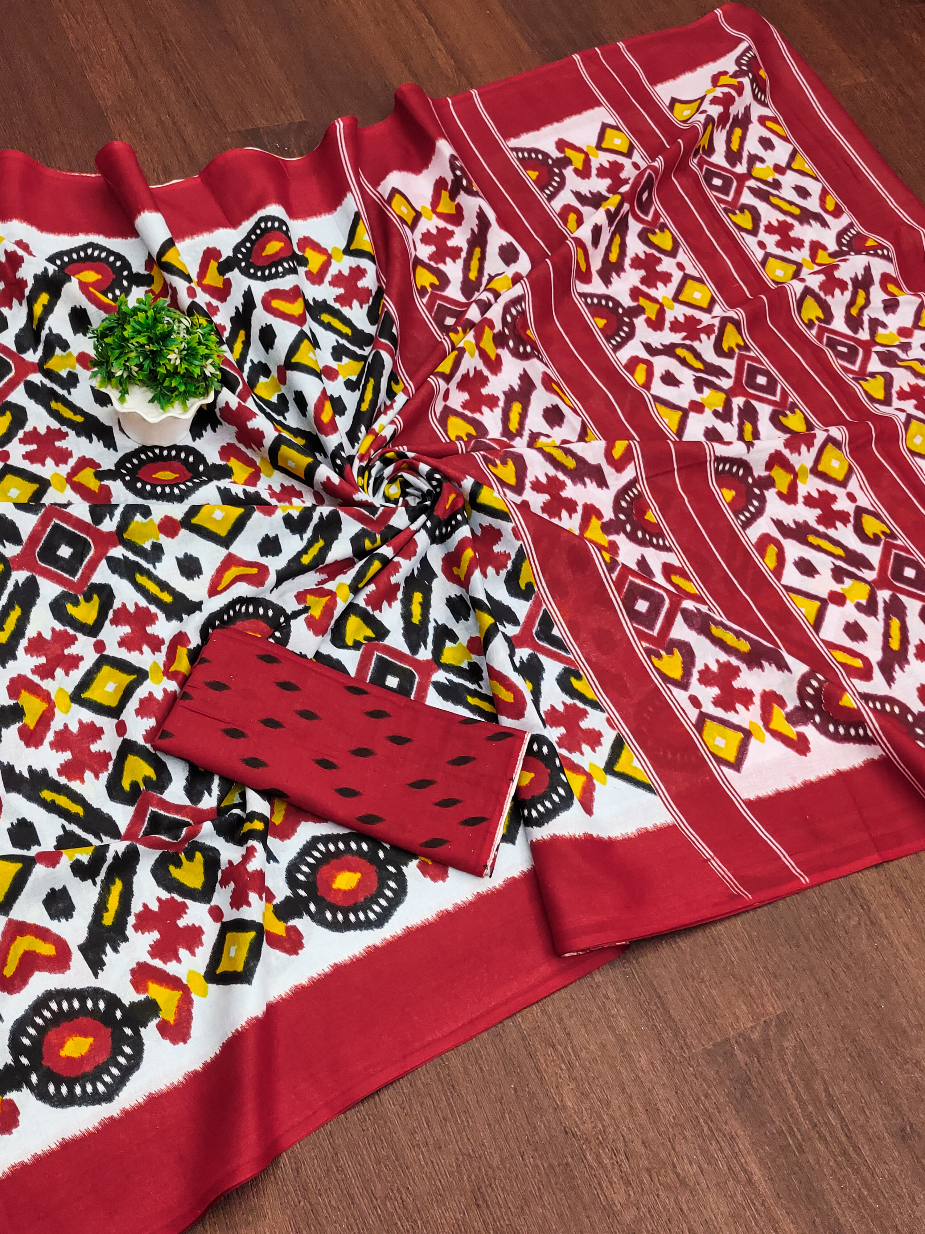 NAYANTHARA PURE MULMUL COTTON IKKAT PRINTD RED AND YELLOW SAREE