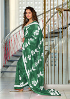 PETAL PARADISE FLORAL HAND PRINT MULMUL COTTON BOTTEL GREEN SAREE
