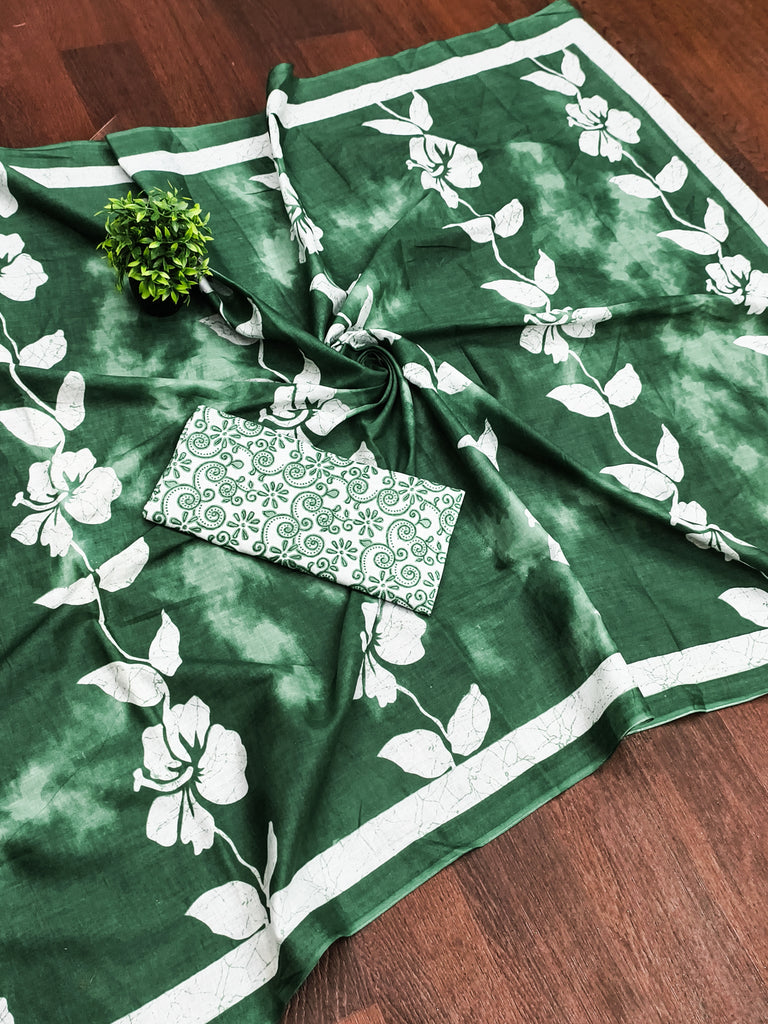 PETAL PARADISE FLORAL HAND PRINT MULMUL COTTON BOTTEL GREEN SAREE