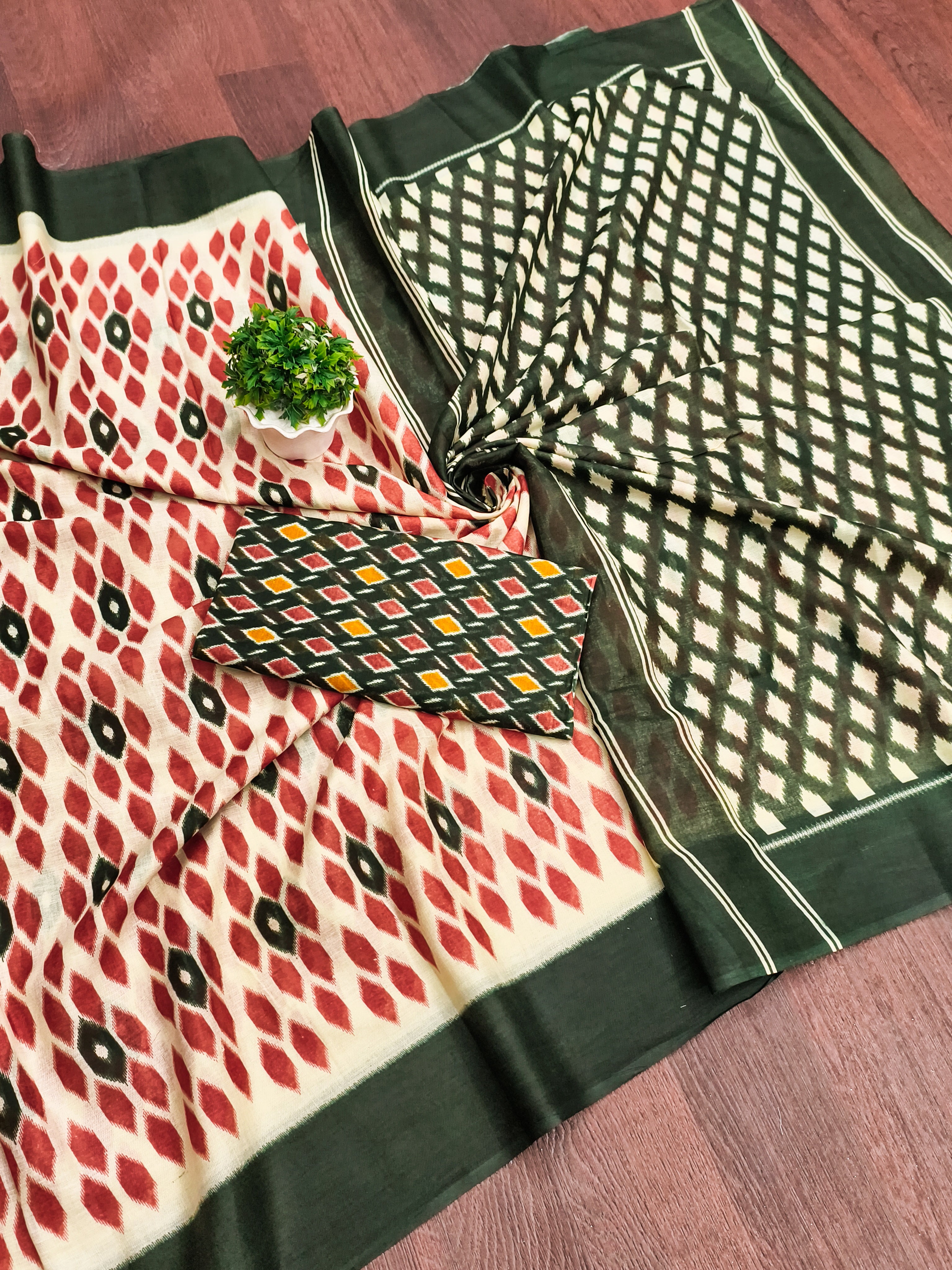 PRIYALAXMI PURE MULMUL COTTON IKKAT PRINTD DARK GREEN AND PEACH SAREE