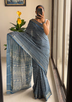 SELFI PRIMUM MULMUL COTTON WITH HEVY ZARI BORDAR BAGRU BANDHANI PRINTED TEAI BLUE SAREE