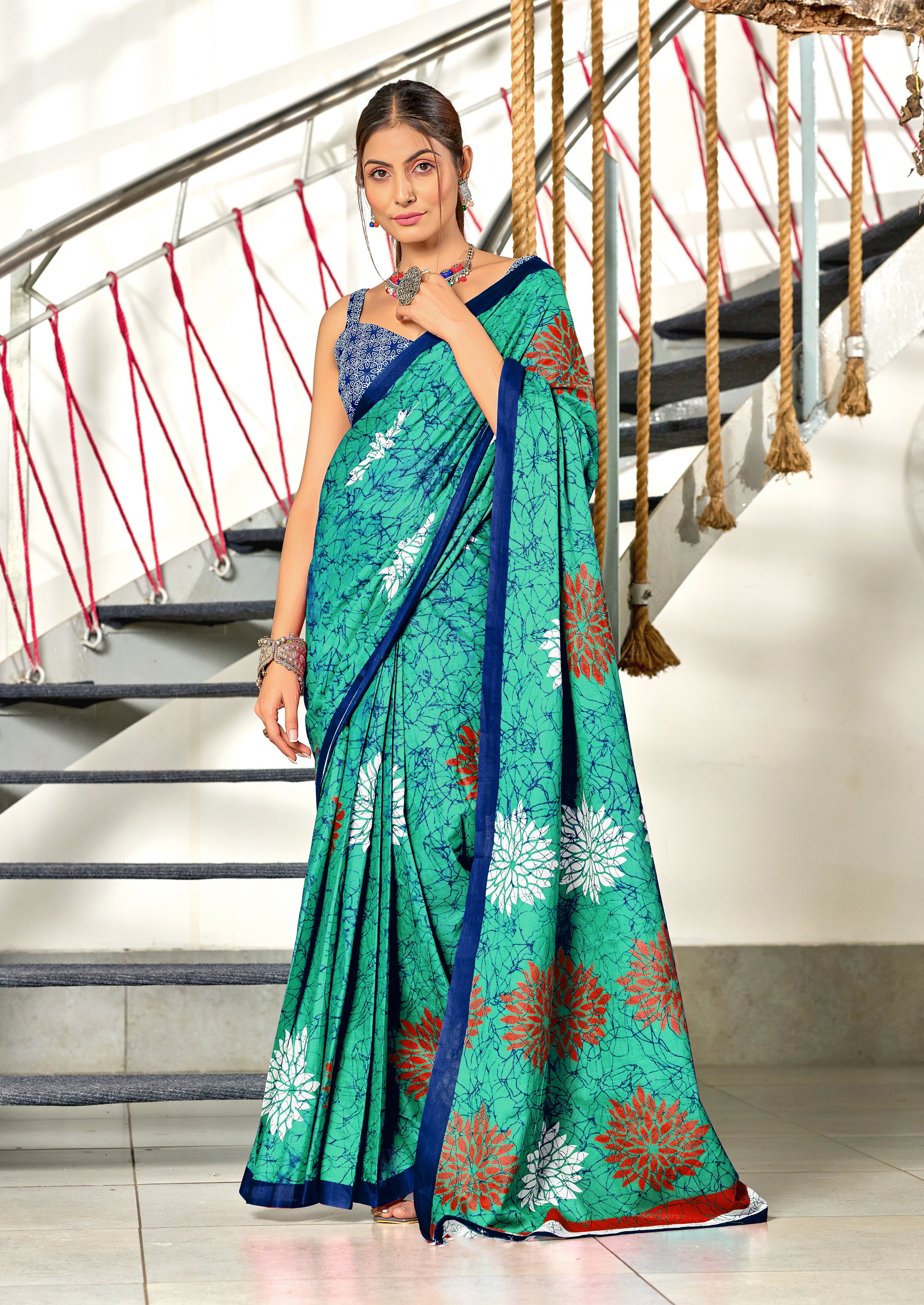 SRIVIDYA PURE MULMUL FLORAL BLOCK PRINTD AQUA SAREE
