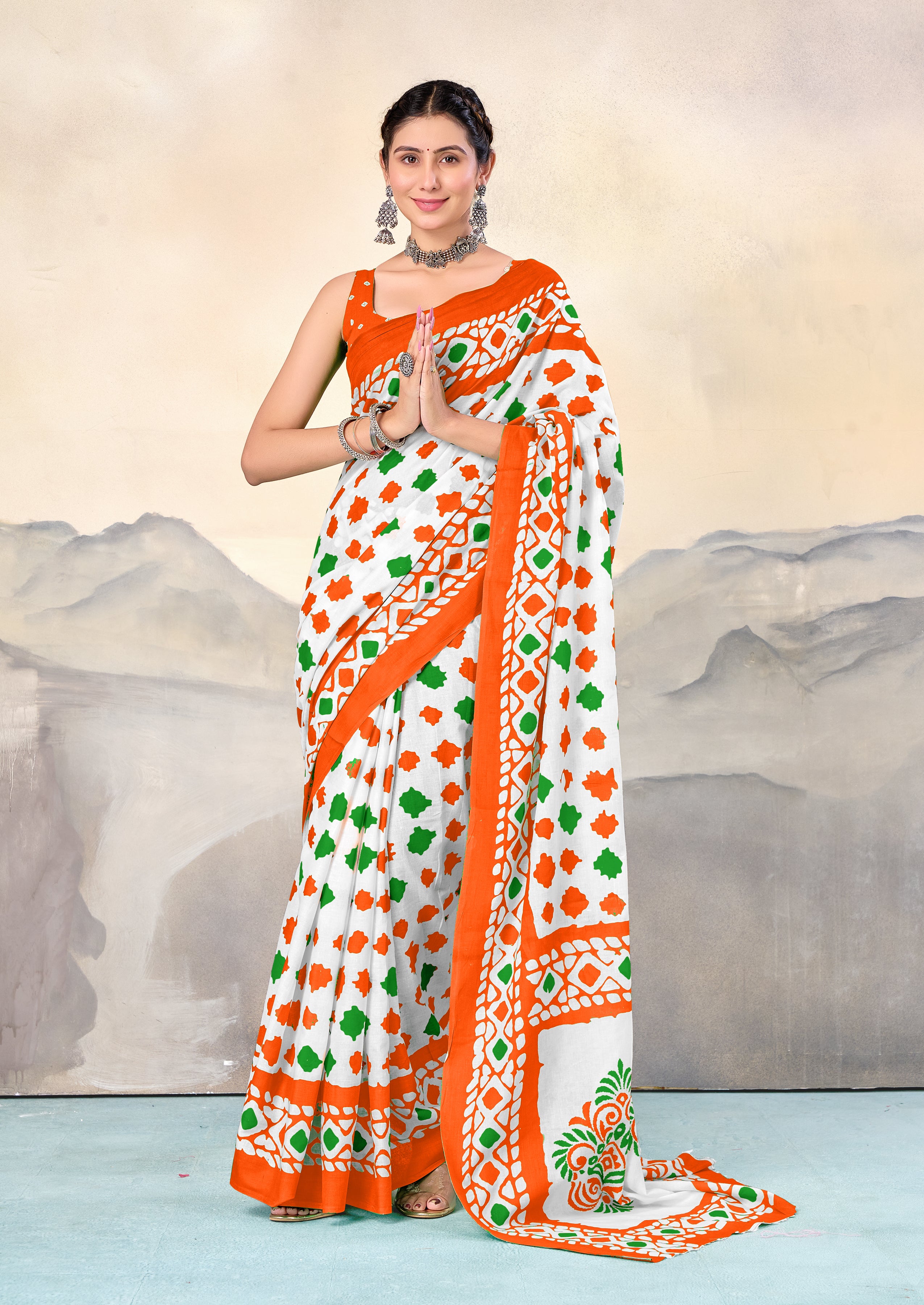 TIRNGA SOFT PURE COTTON BLOCK PRINTED ORANGE SAREE