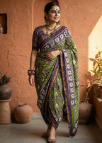 SOFT MASLIN MULMUL COTTON WITH HEVY ZARI BORDER MEHANDI GREEN SAREE WITH BLOUSE