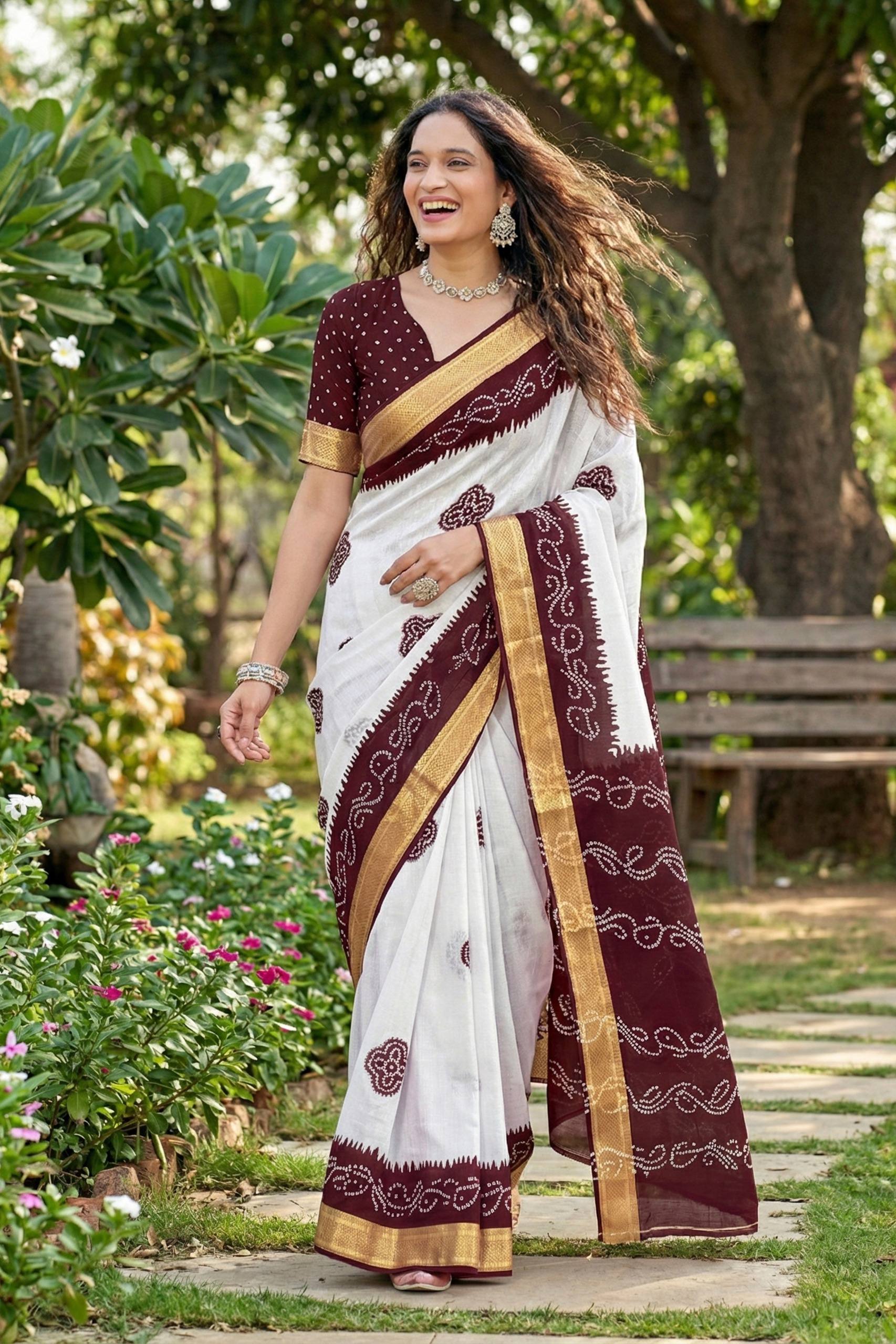 MULMUL COTTON BANDHANI BLOCK PRINT WITH HEAVY ZARI BORDER WHITE AND MAROON SAREE WITH BLOUSE